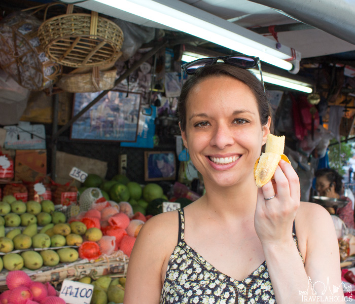 Tara with a tiny Thai banana.