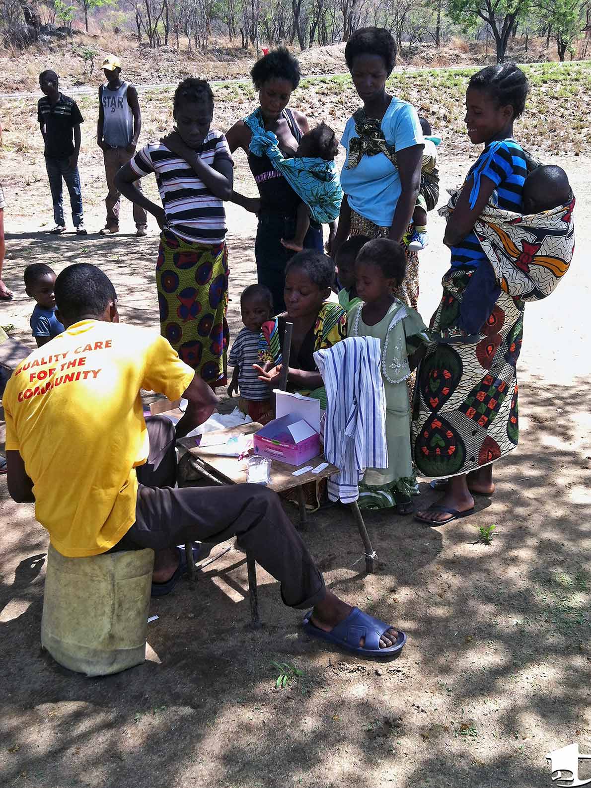 Health Worker Administering Malaria Tests in Zambia